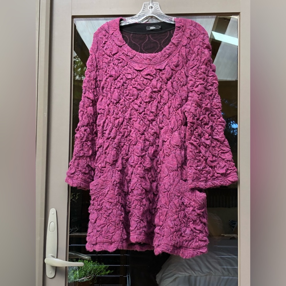 Dressy sweater top.